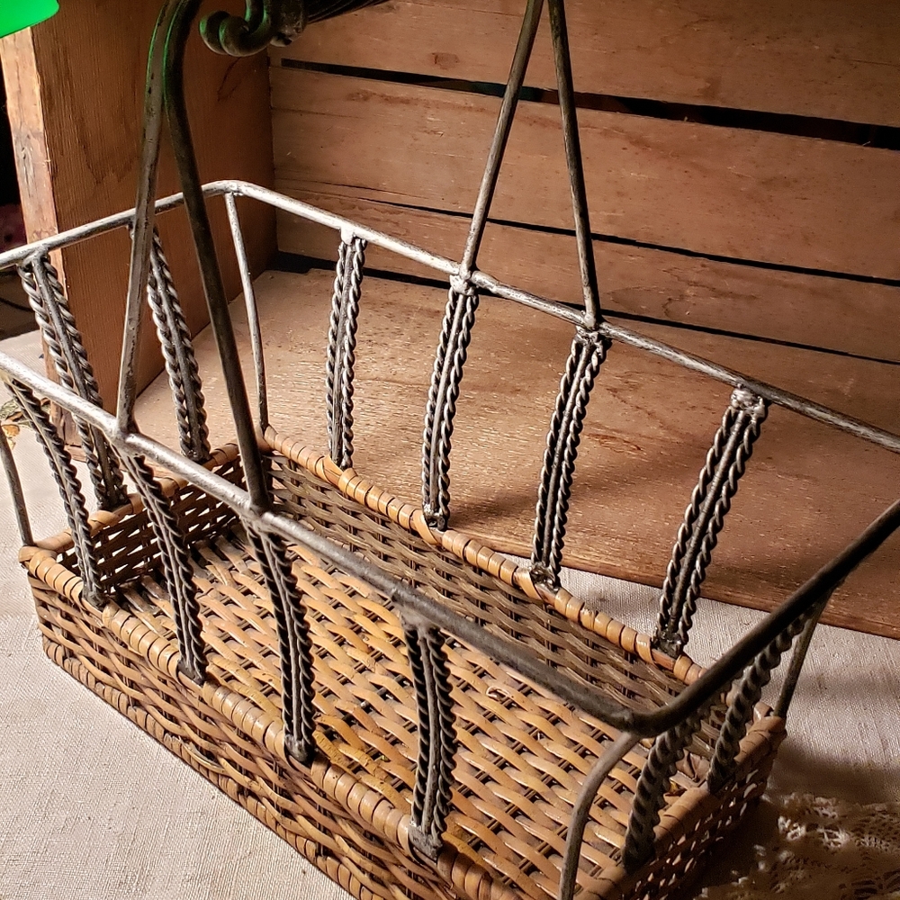 Heavy metal and rattan bottom.